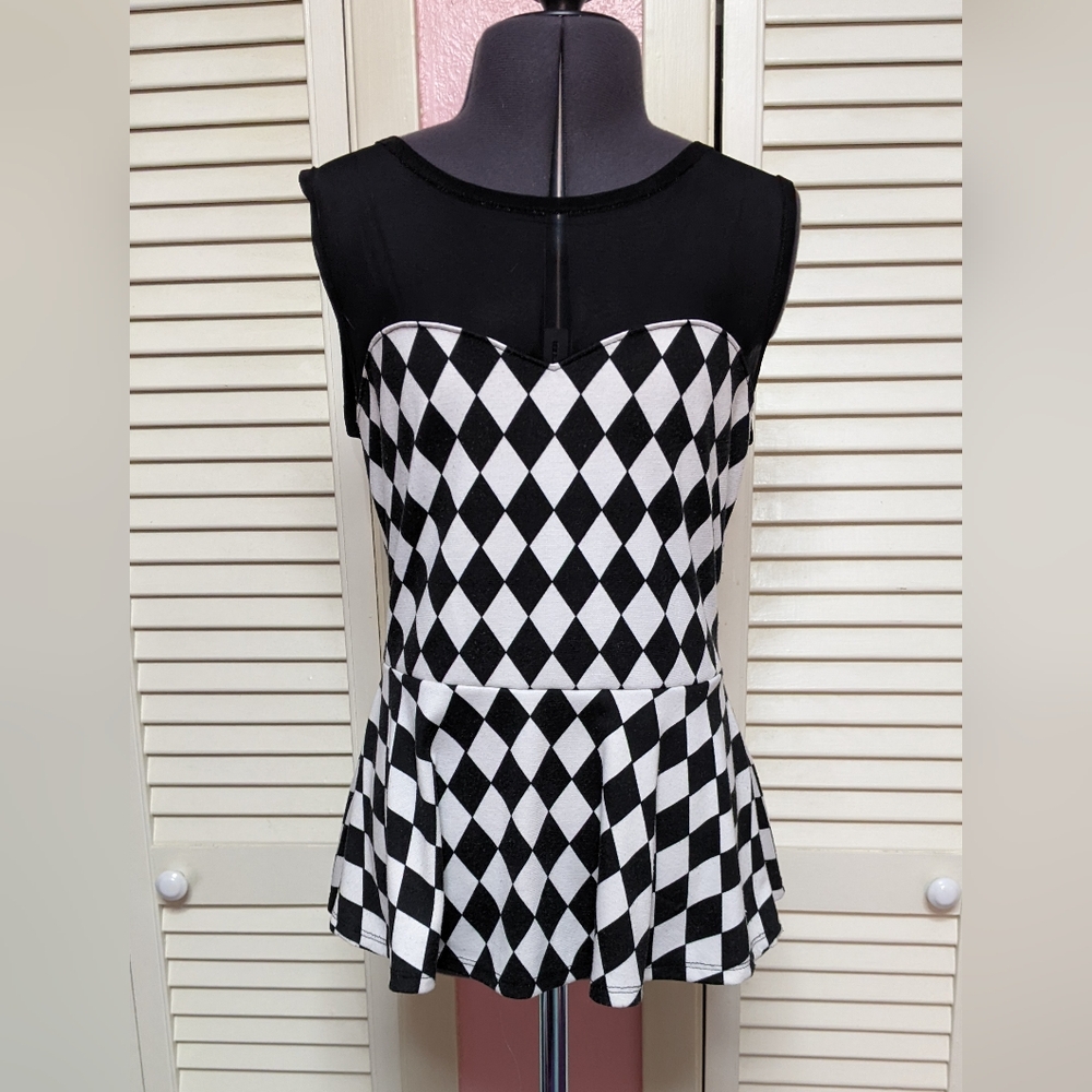 Harlequin sweetheart peplum top
